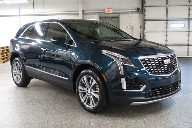 2026 Cadillac XT5 Premium Luxury in Emerald Lake Metallic — front three-quarter view
