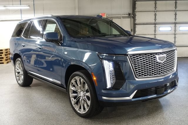 2026 Cadillac Escalade Luxury in Deep Sea Metallic — front three-quarter view